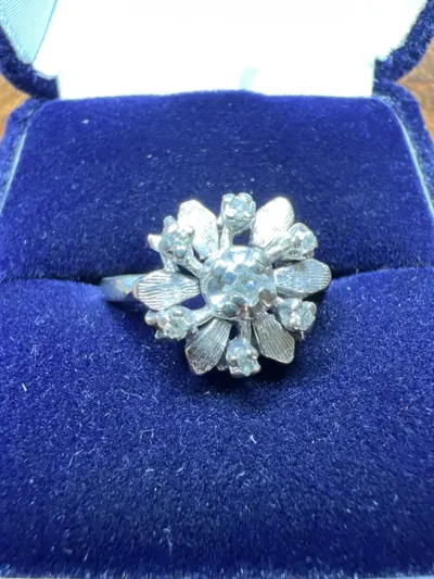 Lady's Diamond Fashion Ring 7 Diamonds .12 Carat T.W. 14K White Gold