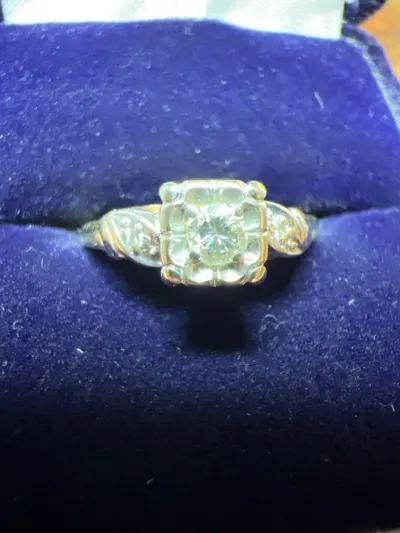 Lady's Diamond Fashion Ring 3 Diamonds .14 Carat T.W. 14K Yellow Gol