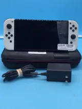 Nintendo Switch Handheld Oled with Charger & Case Used photo 1