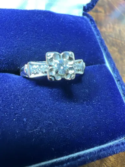 Lady's Diamond Solitaire Ring 5 Diamonds .14 Carat T.W. 14K Yellow Gold