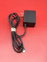 Lite Coral Nintendo Switch Handheld with Charger photo 3
