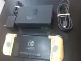 Nintendo Switch Handheld with Dock & Hori Grip Controllers photo 2