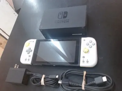 Nintendo Switch Handheld with Dock & Hori Grip Controllers
