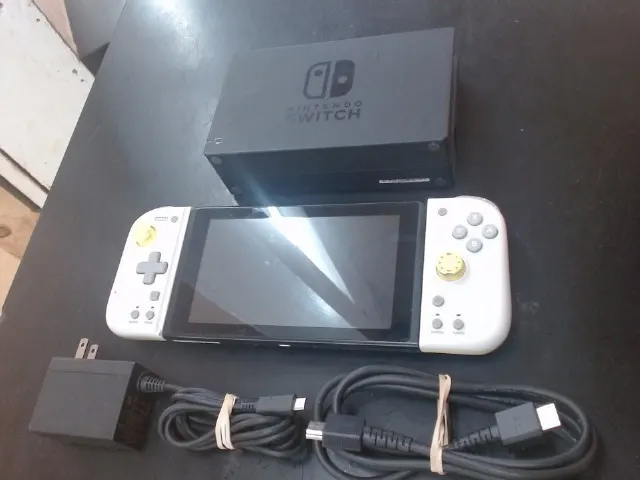 Nintendo Switch Handheld with Dock & Hori Grip Controllers